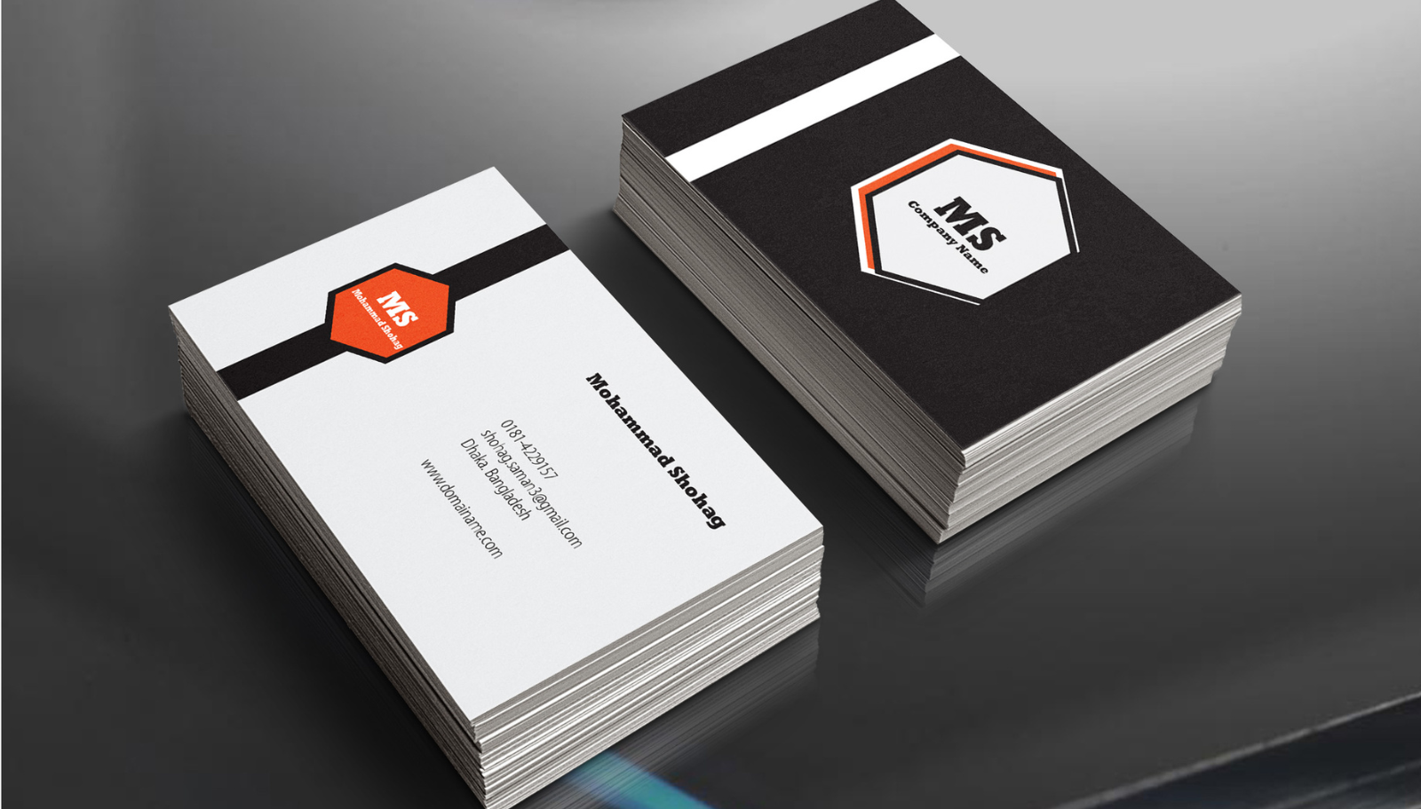Stacks of business cards collected at a conference